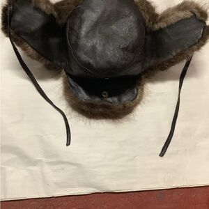 Brown leather and fur aviator hat
